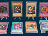 a lot of cards that are on display on a table