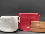 three different types of purses on a gray background