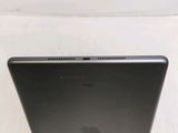 an apple laptop computer sitting on top of a white table