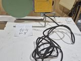 a table with a lot of wires and a radio on it