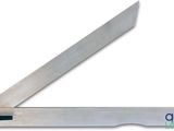 the knife is sitting on top of a fork and knife holder