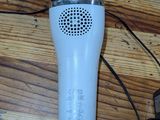 a hair dryer that is connected to a charger