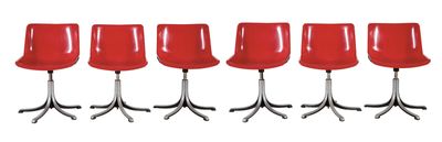 six red chairs sitting on top of each other in a row