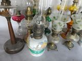 many different types of glass and metal items on the table