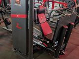 a gym with a lot of machines in the room