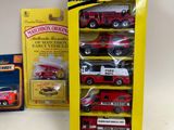 a lot of toy vehicles that are in a display case