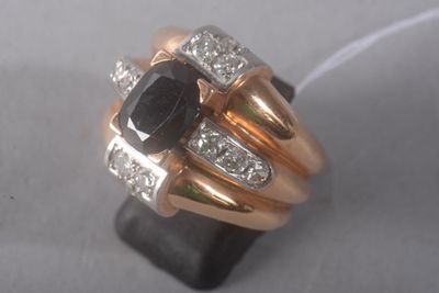 an image of a black and white diamond ring on a stand