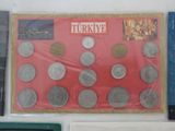 a picture of a display of coins on the wall