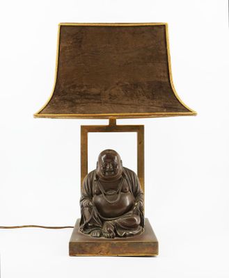 buddha lamp with a brown shade on a white background