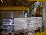 a large stack of boxes on a pallet in a warehouse