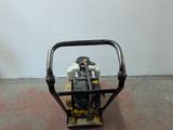 a small machine that is sitting in the middle of the floor