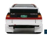 a picture of a white truck with a green license plate