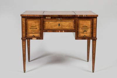 a wooden desk with two drawers and a drawer on top of it
