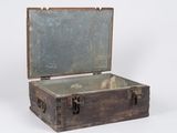 an old wooden box with a mirror inside of it