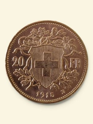 Gros plan sur une pièce de monnaie portant des armoiries
