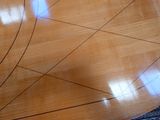an image of a wooden table with a pattern on it