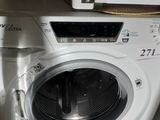 a washing machine that is sitting on a counter