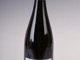 a bottle of wine that is sitting on a table