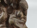 a statue of a woman holding a baby in her arms