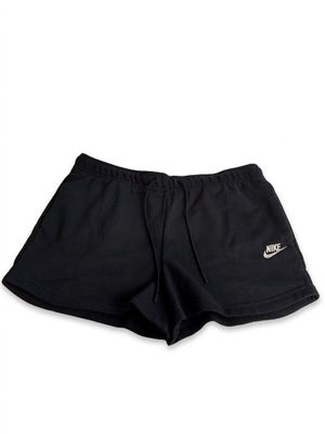 the nike shorts are black and have a white logo on the side