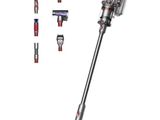 a close up of a cordless vacuum cleaner on a white background