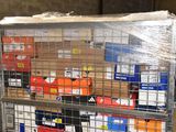 a metal rack with many boxes on it in a warehouse