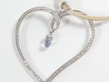 sterling silver heart pendant with blue topaz and diamond accents