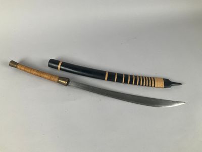two swords with wooden handles on a white surface