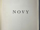 an open book with the words now written on it