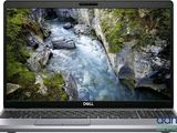 the dell dell laptop is open on a white background
