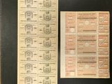 un vieux dossier noir sur lequel sont posés de nombreux papiers