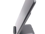 a cell phone that is sitting on top of a stand