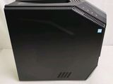 an image of a black desktop computer sitting on top of a white surface