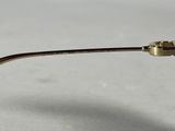 a close up of a pair of glasses on a table