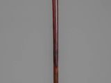an image of a wooden stick with a skull on top of it