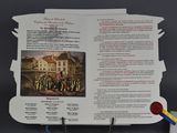an open book with a picture of a group of people on it