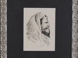 portrait of a bearded man with a hoodie in a silver frame