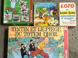 trois livres posés par terre