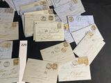 a lot of old envelopes sitting on a table