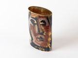 a vase with a picture of a man on it