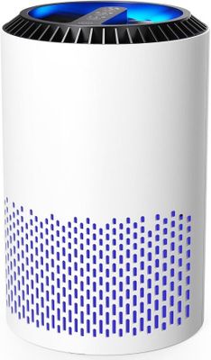 un purificateur d'air blanc orné de lumières bleues
