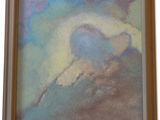 peinture au pastel représentant des nuages, dans un cadre marron sur fond blanc