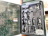 a box that has a set of chess pieces in it