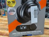 an image of a box of steelseries headphones on a wooden table