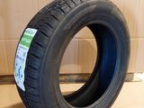 a close up of a tire on a cardboard box on a floor