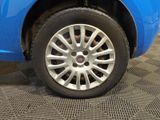 a close up of a car ' s tire on the floor