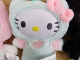 many hello kitty stuffed animals sitting in a basket