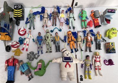 a lot of action figures that are on the table