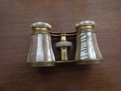 a pair of binoculars that are on a table