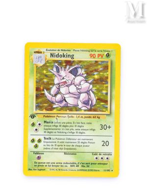 a close up of a pokemon card on a white surface